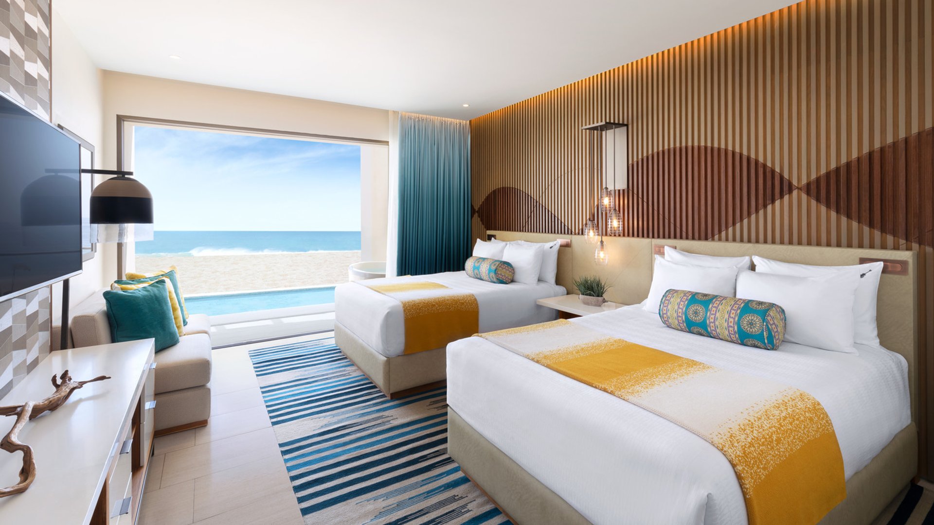 Rock Suite Swim up Ocean Front (Two Bedroom) with Personal Assistant, Multigenerational Cabo: One Resort That Works for 