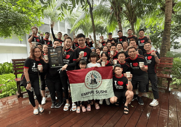 a group of people posing for a photo