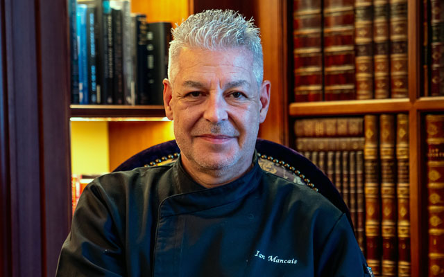 a man in a black jacket