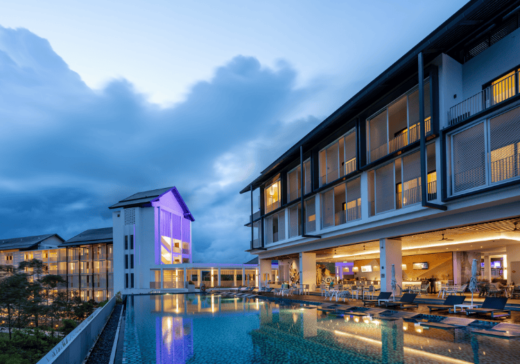 a pool in front of a building