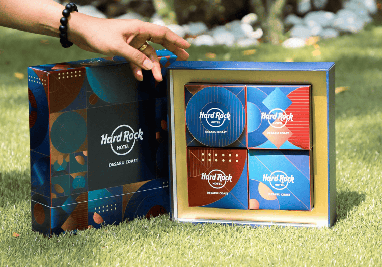 a hand reaching out to a box