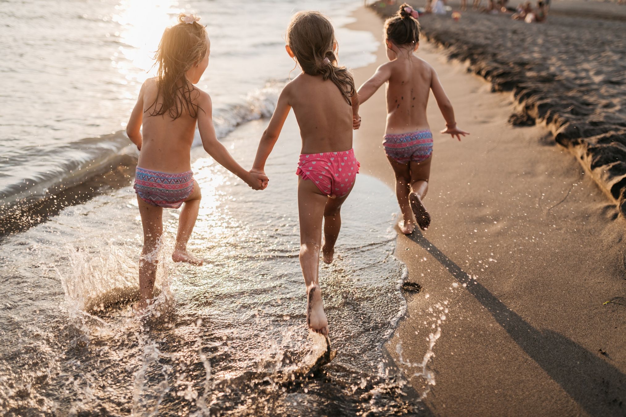 Children enjoying the beach at Hard Rock Hotel Maldives