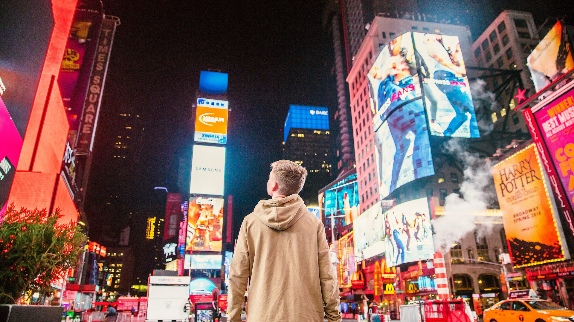 Guest enjoying Midnight Moment in Times Square while staying at Hard Rock Hotel New York