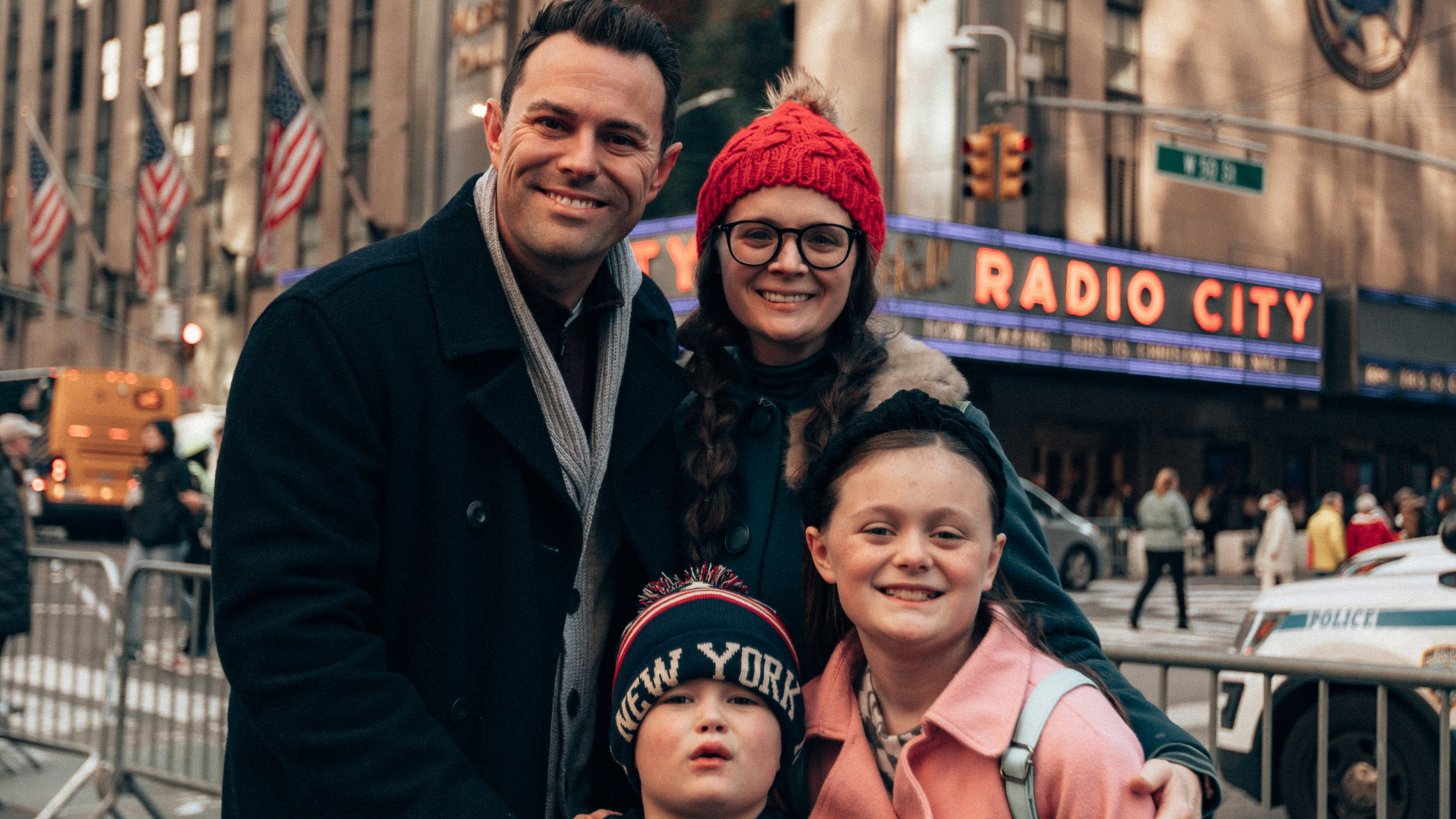 A family outside Radio City Music Hall