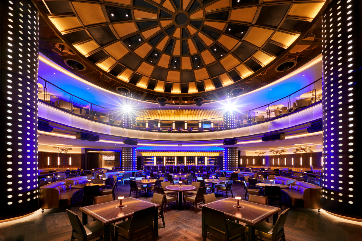 a large room with tables and chairs